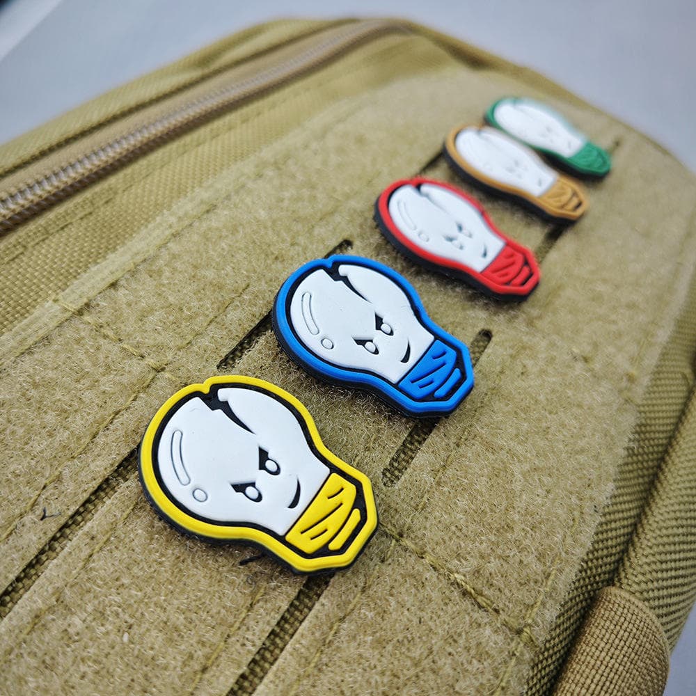 Custom PVC pin badges: cartoon ghost badges on bag