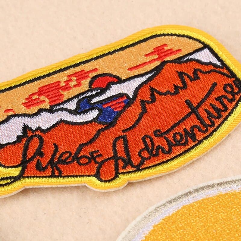 Temporary review photograph: a colourful embroidered patch