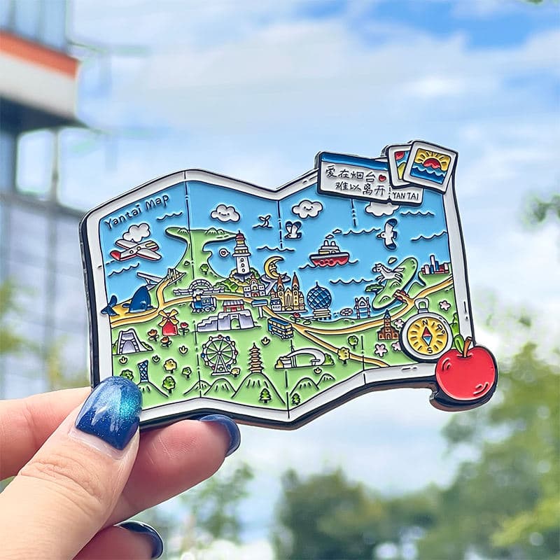 Custom travel map enamel fridge magnet shown in hand