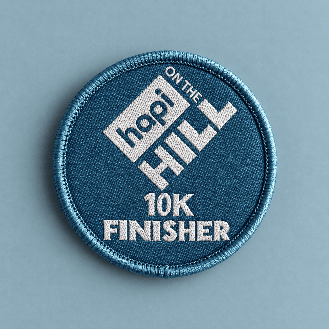 Custom woven patch with 10K finisher design