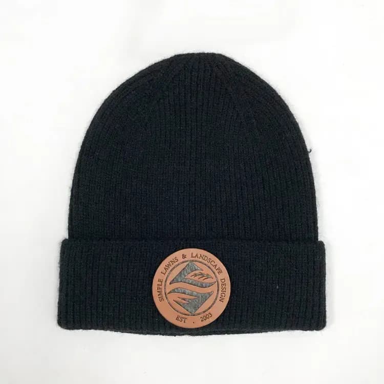 Custom black beanie with leather logo