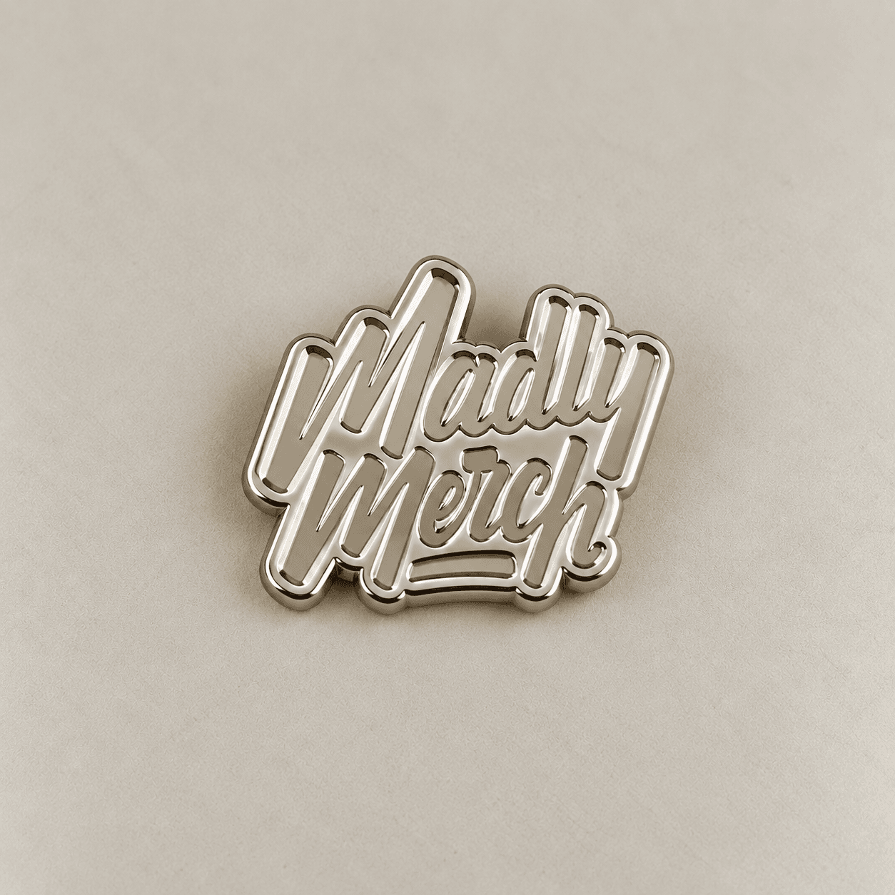 Nickel-toned plated metal wordmark sample.