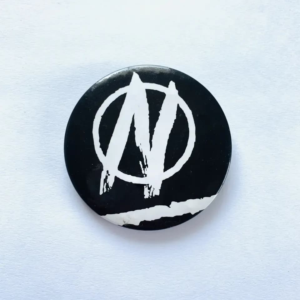 Printed pin badges from the live Printed Button Badges page: colourful printed badge