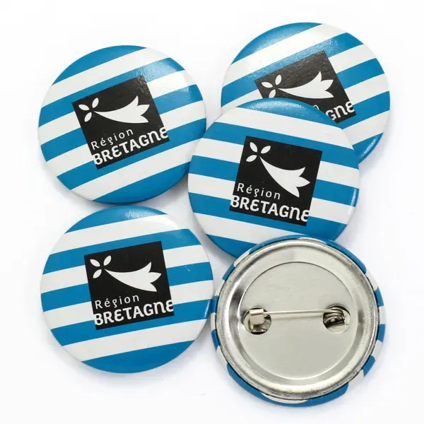 Printed pin badges from the live Printed Button Badges page: badge backing