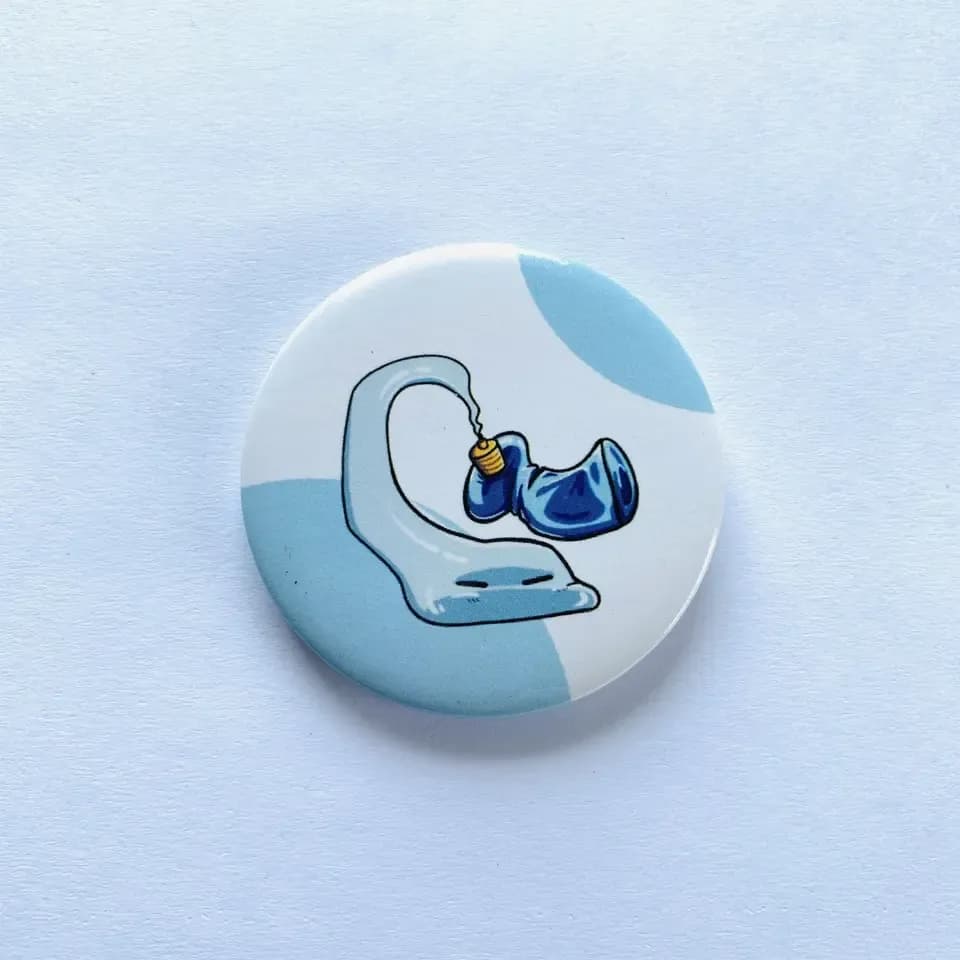 Printed pin badges from the live Printed Button Badges page: printed finish