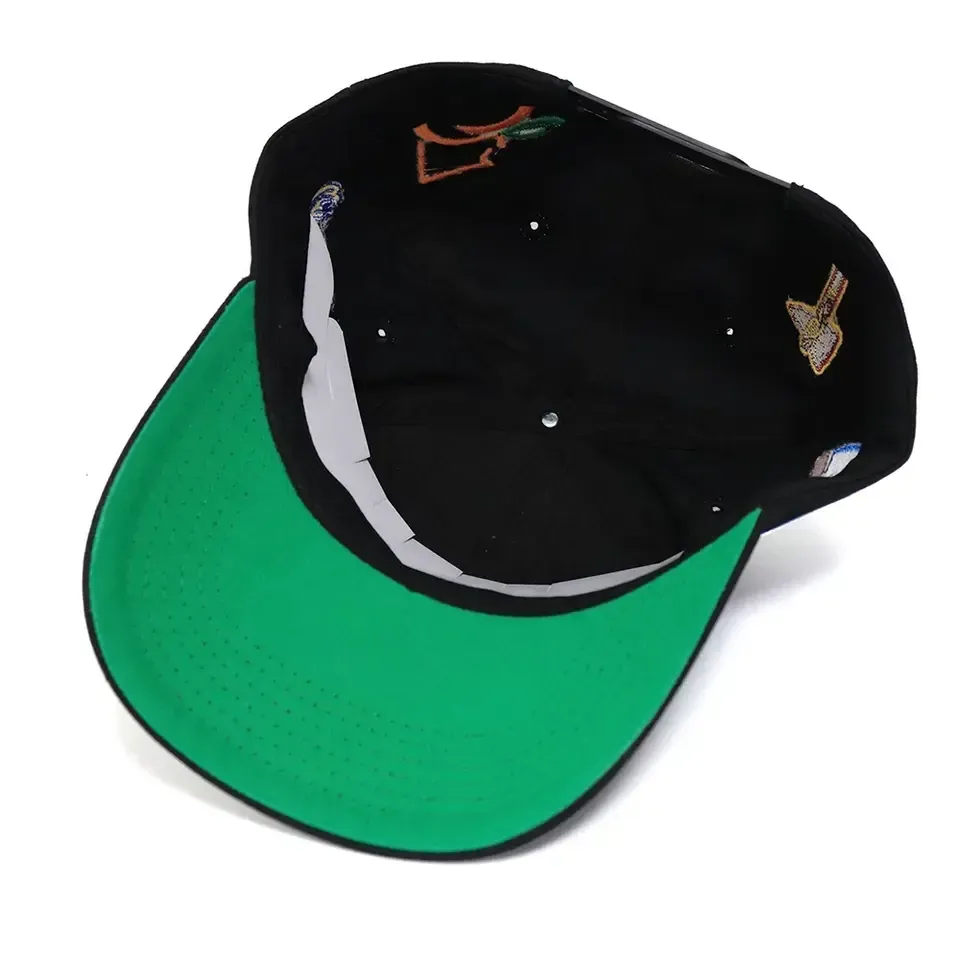 Black baseball hat with embroidered letter logo