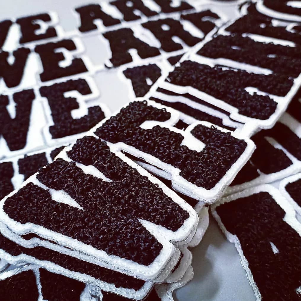 Chenille patches from the live Chenille Patches page: black and white chenille patch