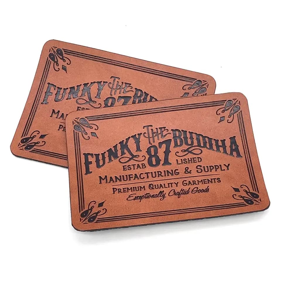 Leather patches from the live Custom Leather Patches page: high-detail logo patch