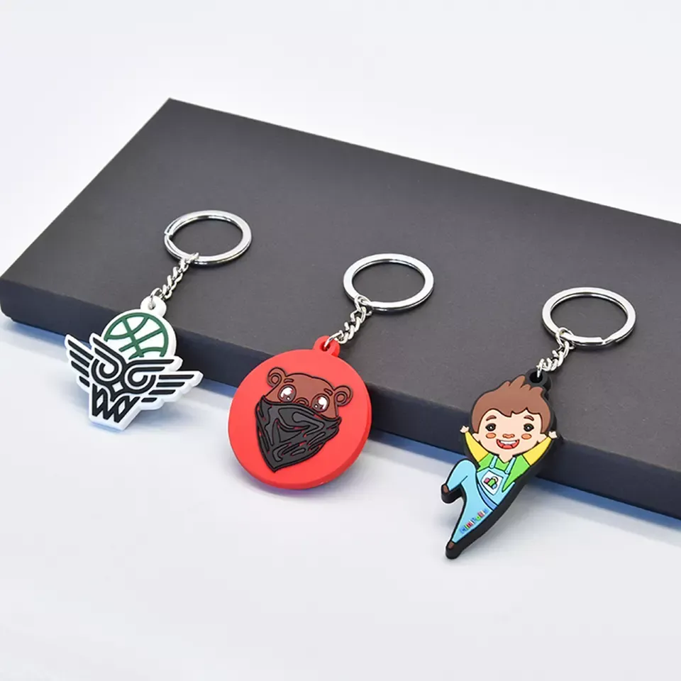 PVC rubber keyrings from the live page: custom logo rubber keyring
