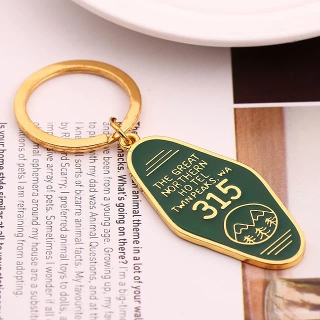 Soft enamel keyrings from the live page: group of custom plated keyrings