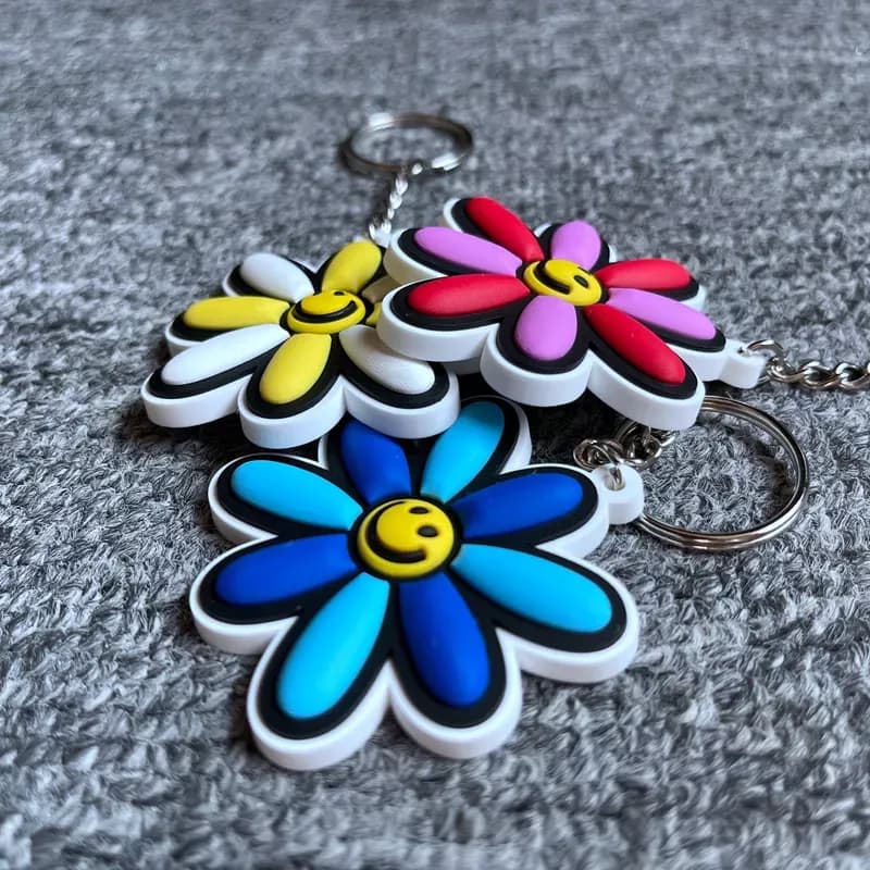 PVC rubber keyrings from the live page: custom flower keyring