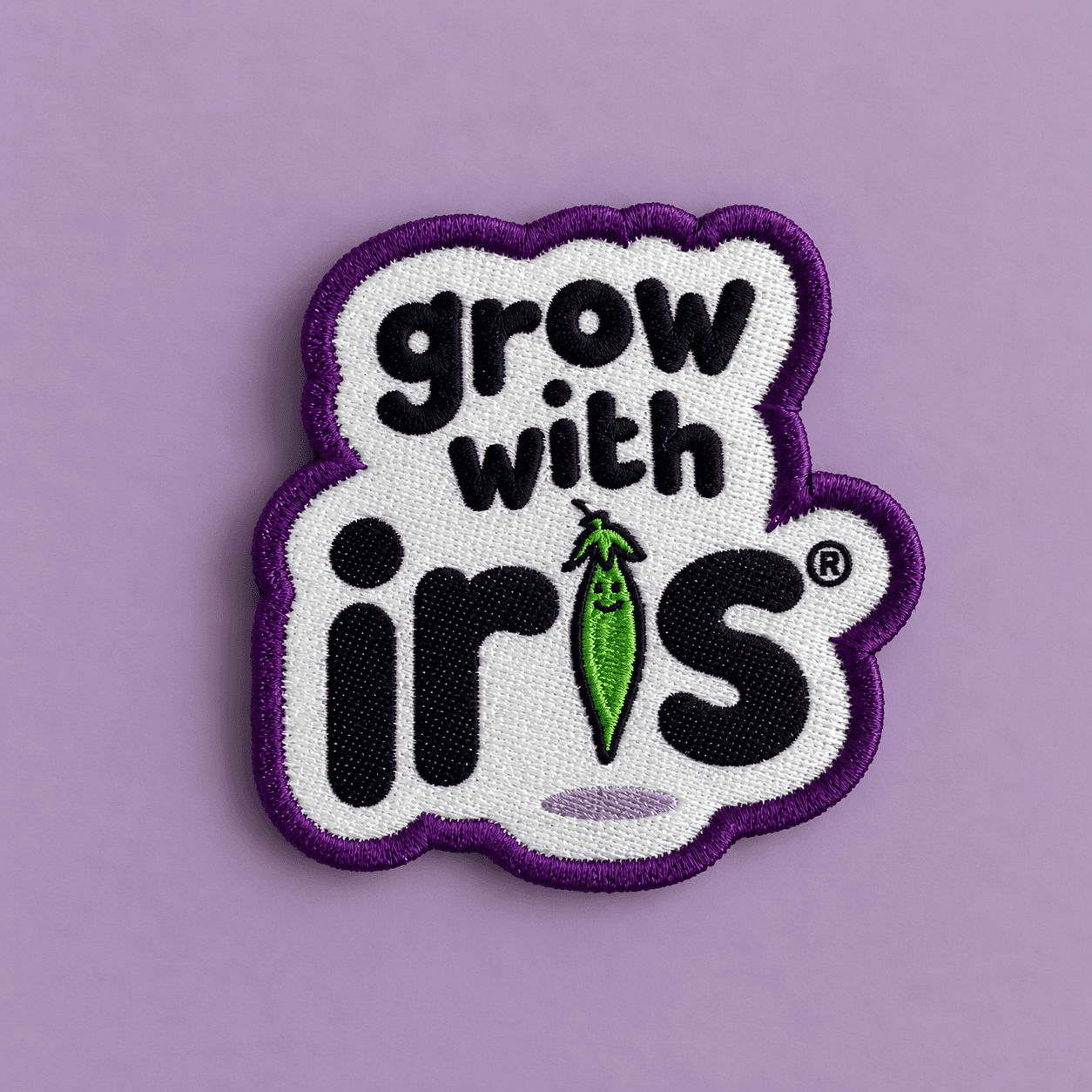 Custom woven patch with Grow With design