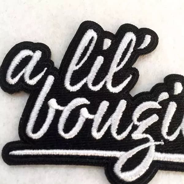 Temporary review photograph: embroidered patch detail