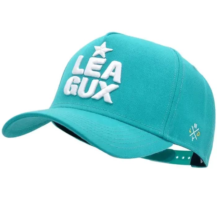 Teal baseball hat with embroidered letter logo