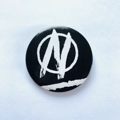 black printed button badge