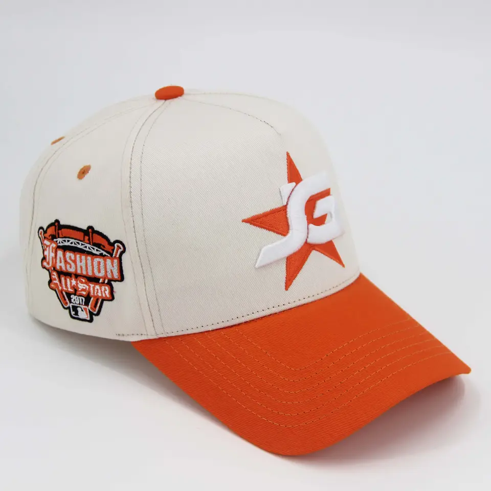 white baseball hat with orange peak